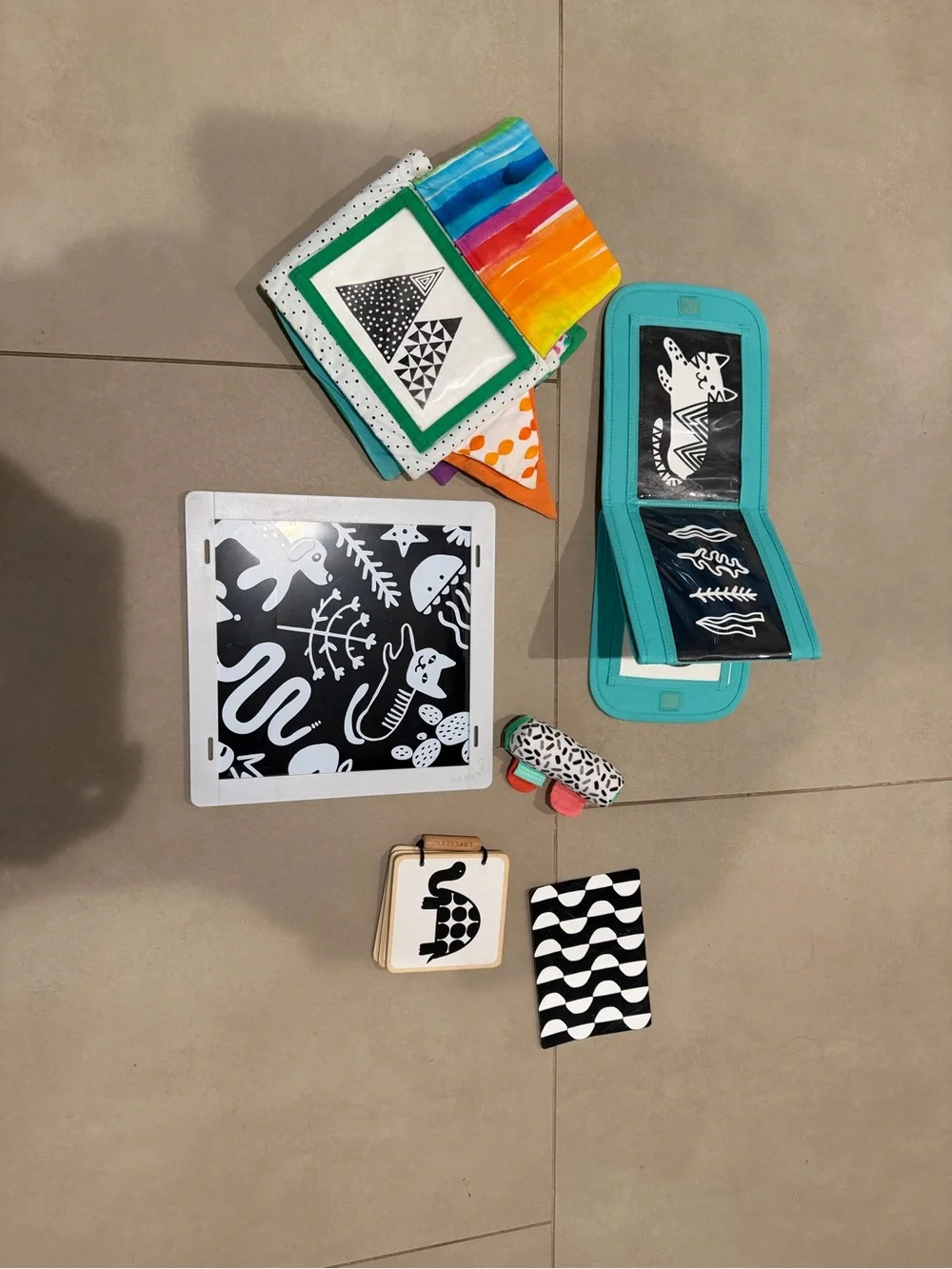 Assorted Lovevery high contrast toys/pictures